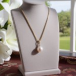 Diamantsmykke i 14kt gull med perle og diamant 0,35ct W-Si - coc4000147