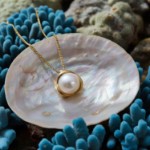 Smykke i 14kt gull med perle - bur210928