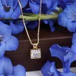 Smykke i gult gull med zirkonia -32500445