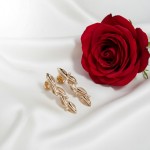 Diamantøredobber i gull med 0,06 ct W-Si - 30710112