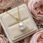 Diamantsmykke i gult gull med 0,025ct W-Si og perle - coc4000083gg