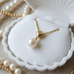 Gullsmykke med ferksvannsperle - 27377