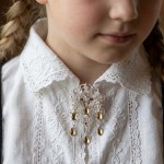 Barnesølje i hvit  og forgylt sølv