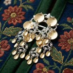 Barnesølje i hvit  og forgylt sølv