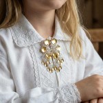 Barnesølje i hvit og forgylt sølv