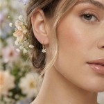 Ørepynt i forgylt sølv hvitveis. LIV - 700403