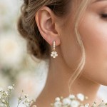 Kreoler i forgylt sølv med cirkonia og jordbærblomst. LIV - 701503